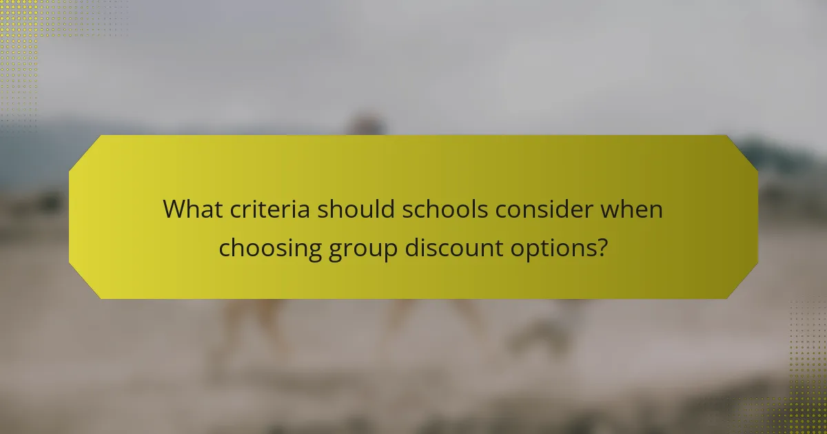What criteria should schools consider when choosing group discount options?